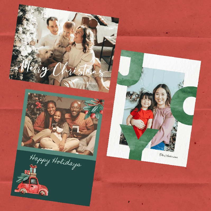 A GIF shows three different holiday cards on a red, textured background. The first card is horizontal and features a family of four and a dog sitting on a couch. It says, "Merry Christmas," and "THE ANDERSON FAMILY." The second card is a vertical collage with a family of four sitting by a Christmas tree, with the text "Happy Holidays," and a red car with a Christmas tree on its roof. The third card is vertical and has the word "JOY" in large, green letters, with a photo of a mother and daughter filling the J, O, and Y, and "The Antonious" written below. The GIF shows a zoom-in on each card, highlighting the details.