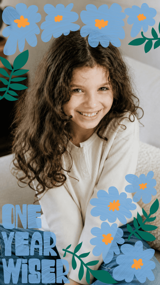 Birthday card template with One Year Wiser in blue script, hand-drawn flowers, and a full photo slot